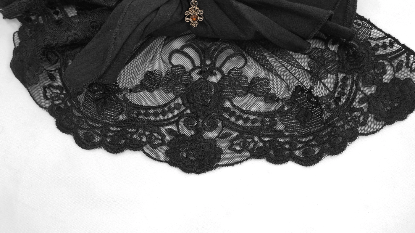Intricate black floral embroidered lace hem panel of gothic jabot showing vintage-inspired embroidery work
