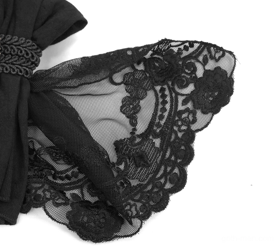 Close-up detail of black lace jabot strap with gold metal charm and floral mesh embroidery