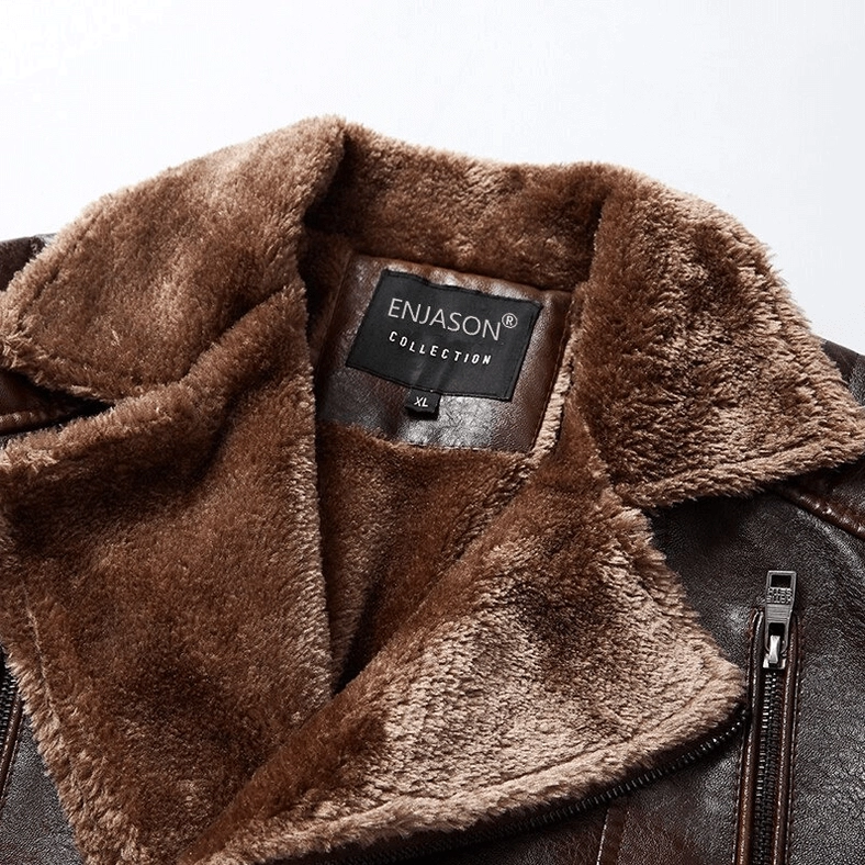 Close-up detail of gothic leather jacket fur collar, metal zipper hardware and branded tag