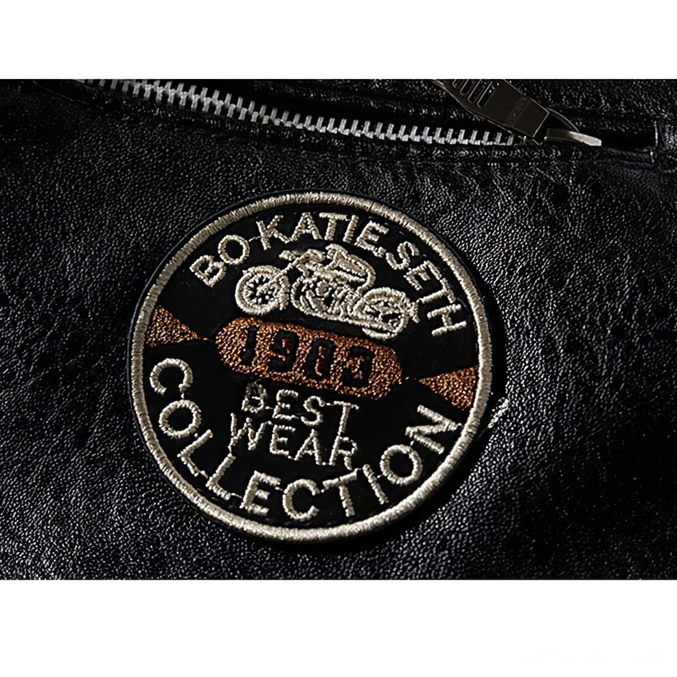 Close-up detail of embroidered motorcycle badge reading BOKATIE SETH 1903 COLLECTION on black leather