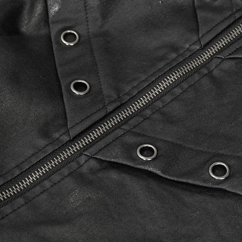 Gothic jacket metal hardware close-up - zipper pull, round eyelets, and coated canvas