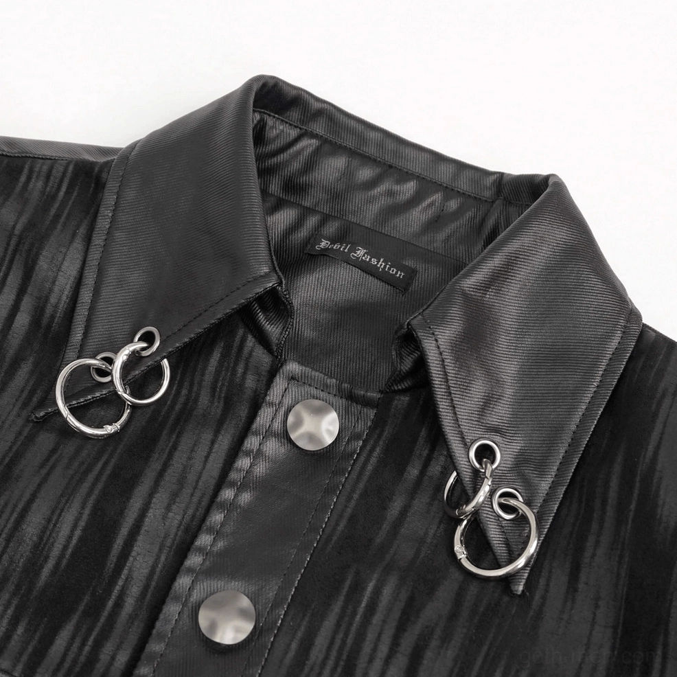 Detail shot of black gothic punk jacket metal rings, eyelets, and structural hardware