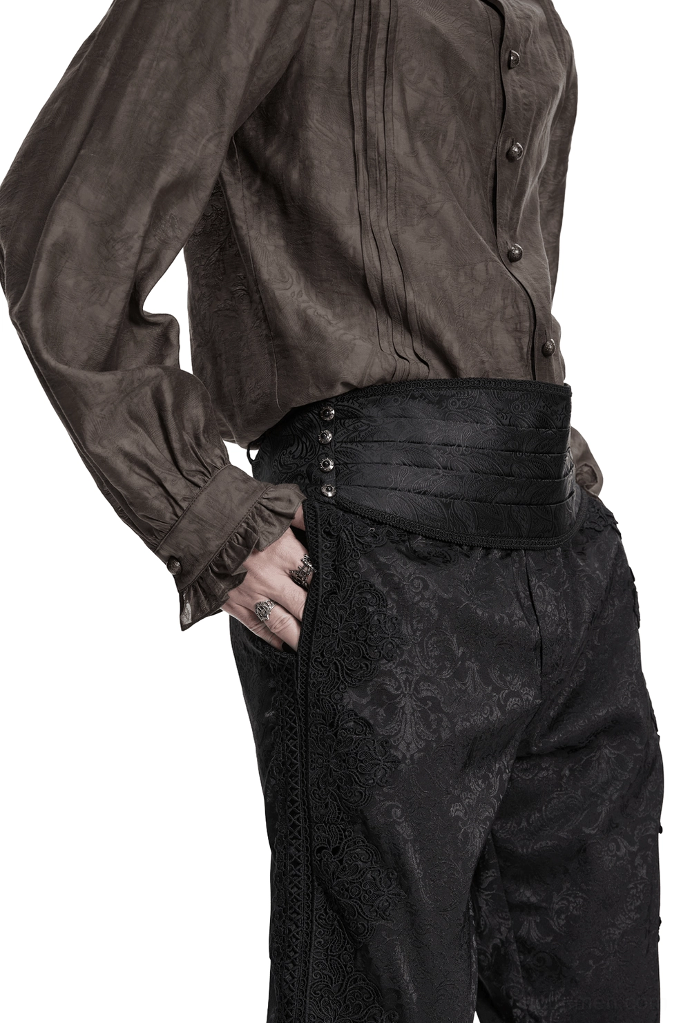 Side angle view of black jacquard gothic waist belt showing paisley texture, metal snap fasteners, and pleated structure on male model