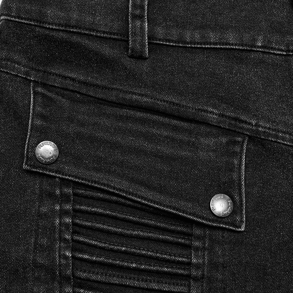 Black denim texture close-up - ribbed stitched panels, metal snap fasteners, washed fabric detail