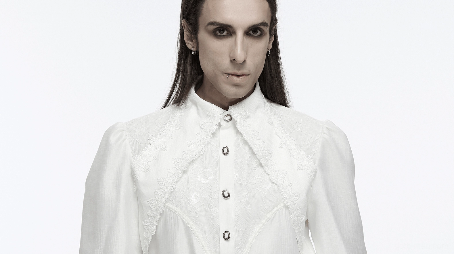 Detailed view of men's gothic shirt sleeve construction and puff sleeve design elements