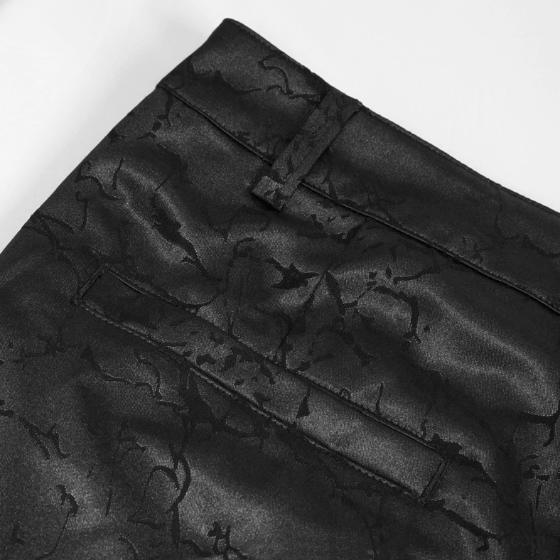 Close-up detail of black gothic cargo pants waist band showing jacquard fabric, belt loops, and cargo pocket construction