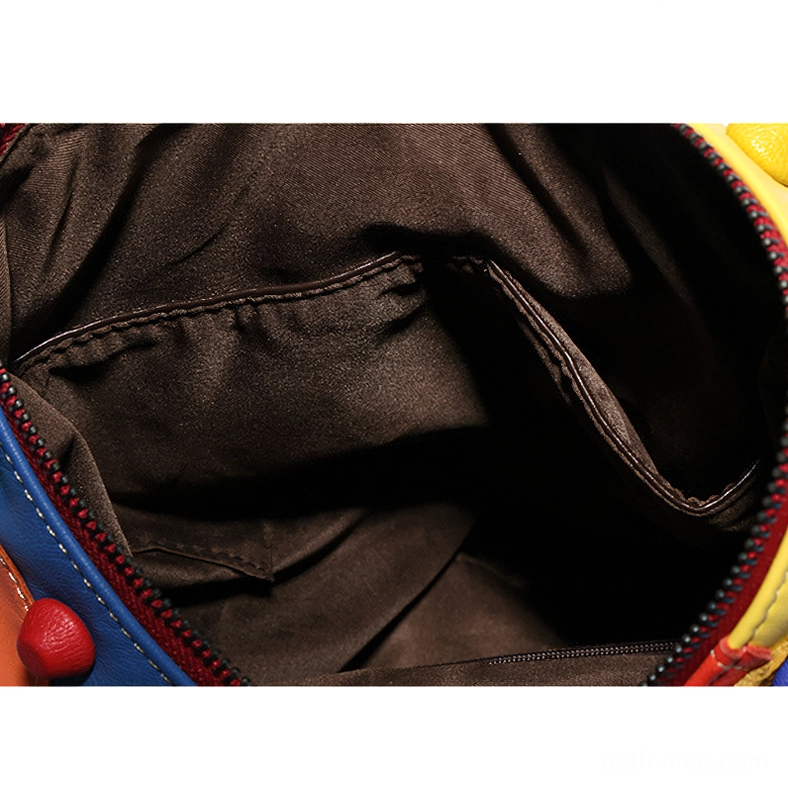 Dark polyester lining interior of Gothic leather backpack with slip pocket organization