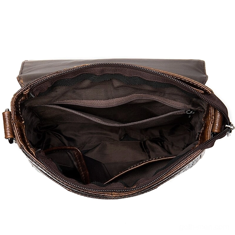 Gothic messenger bag interior compartment - open top view showing dark lining and multiple inner pockets for organization