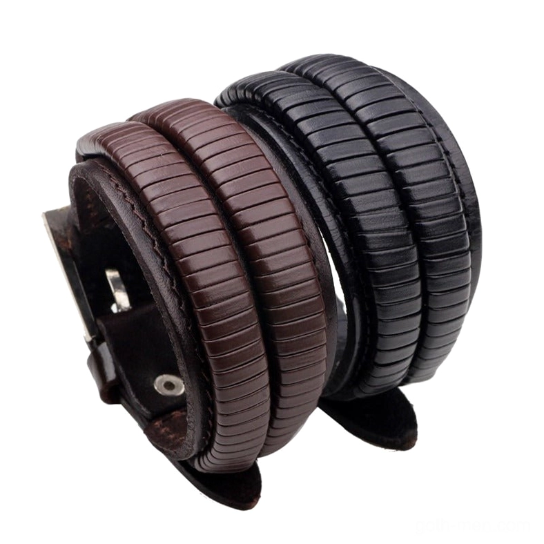 Men's gothic double-wide leather cuff bracelet with embossed leaf pattern, black and brown dual-tone design, adjustable metal buckle, side view