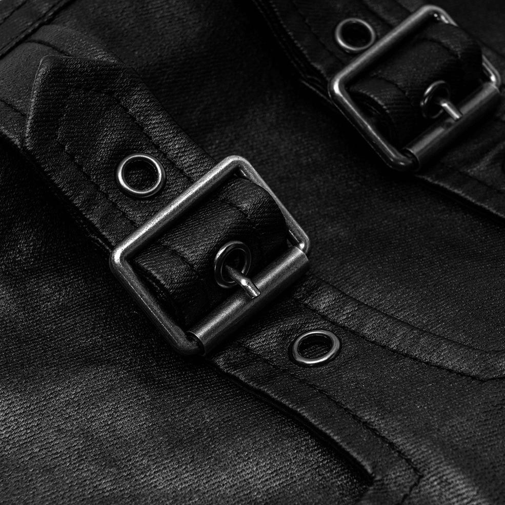 Square belt buckle with metal grommets on black gothic faux leather pants closeup detail