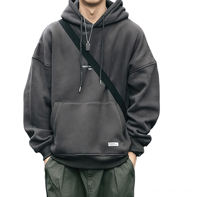 Dark gray gothic letter fleece hoodie with drawstring hood front view on male model