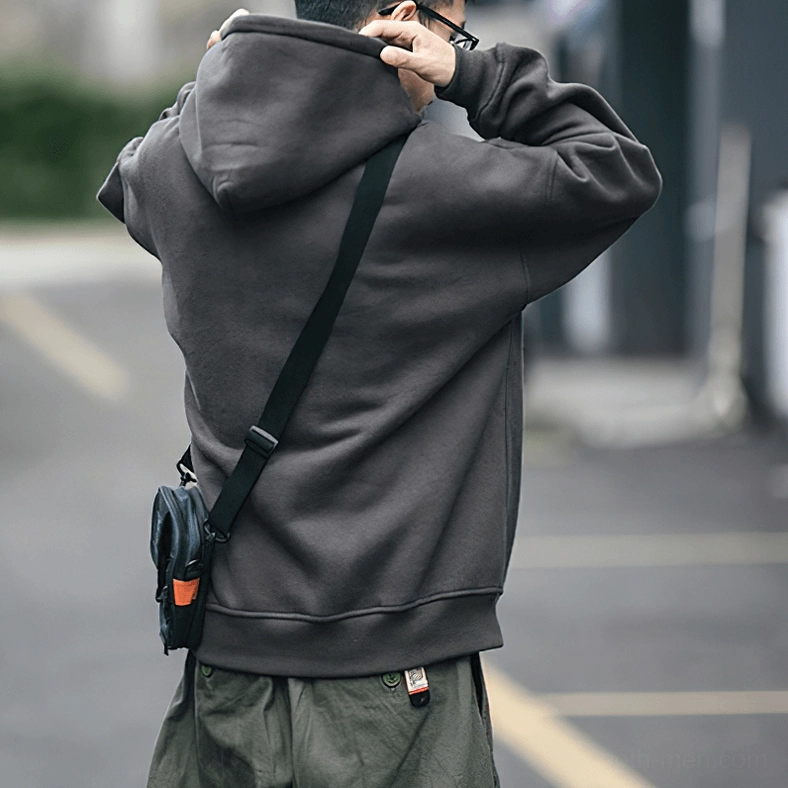 Dark gray letter fleece hoodie front model shot with alternative aesthetic styling