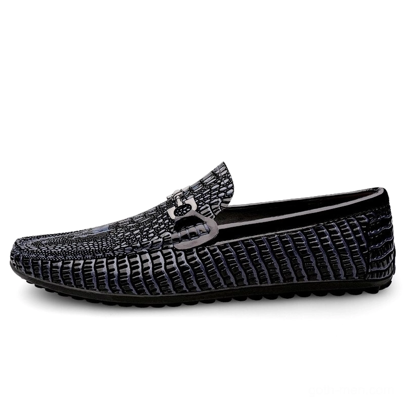 Side profile of men's black gothic leather loafers with crocodile-embossed finish and slip-on design, flat lateral view