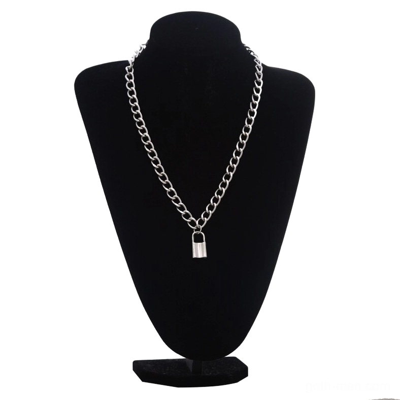 Silver curb chain gothic lock charm necklace showcased on black jewelry stand