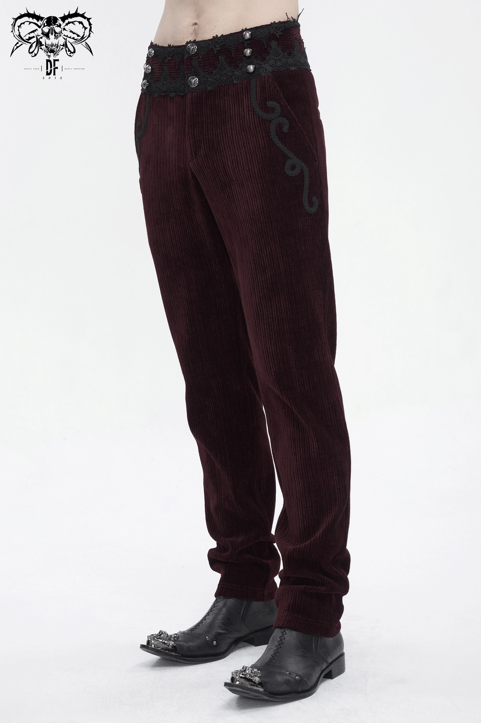 Model wearing wine red lace-trimmed corduroy gothic trousers demonstrating tailored fit and wearability in full length