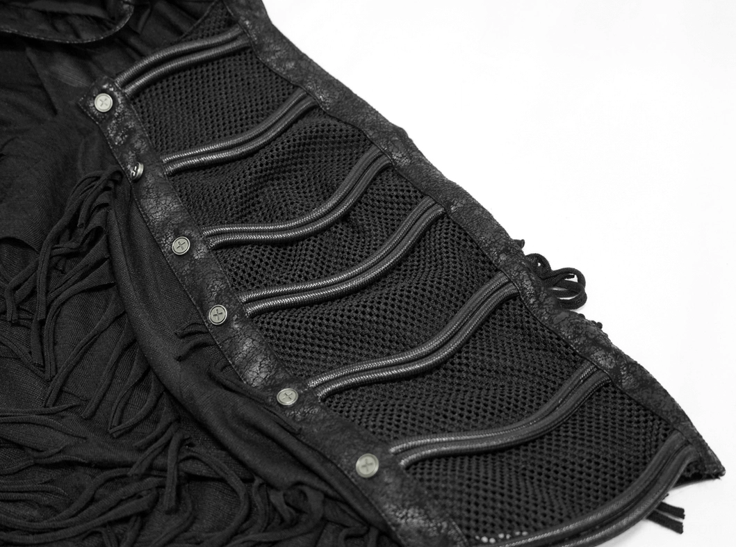 Macro detail of gothic t-shirt mesh panel - metal studs, leather edging and layered fringe accents on black cotton fabric