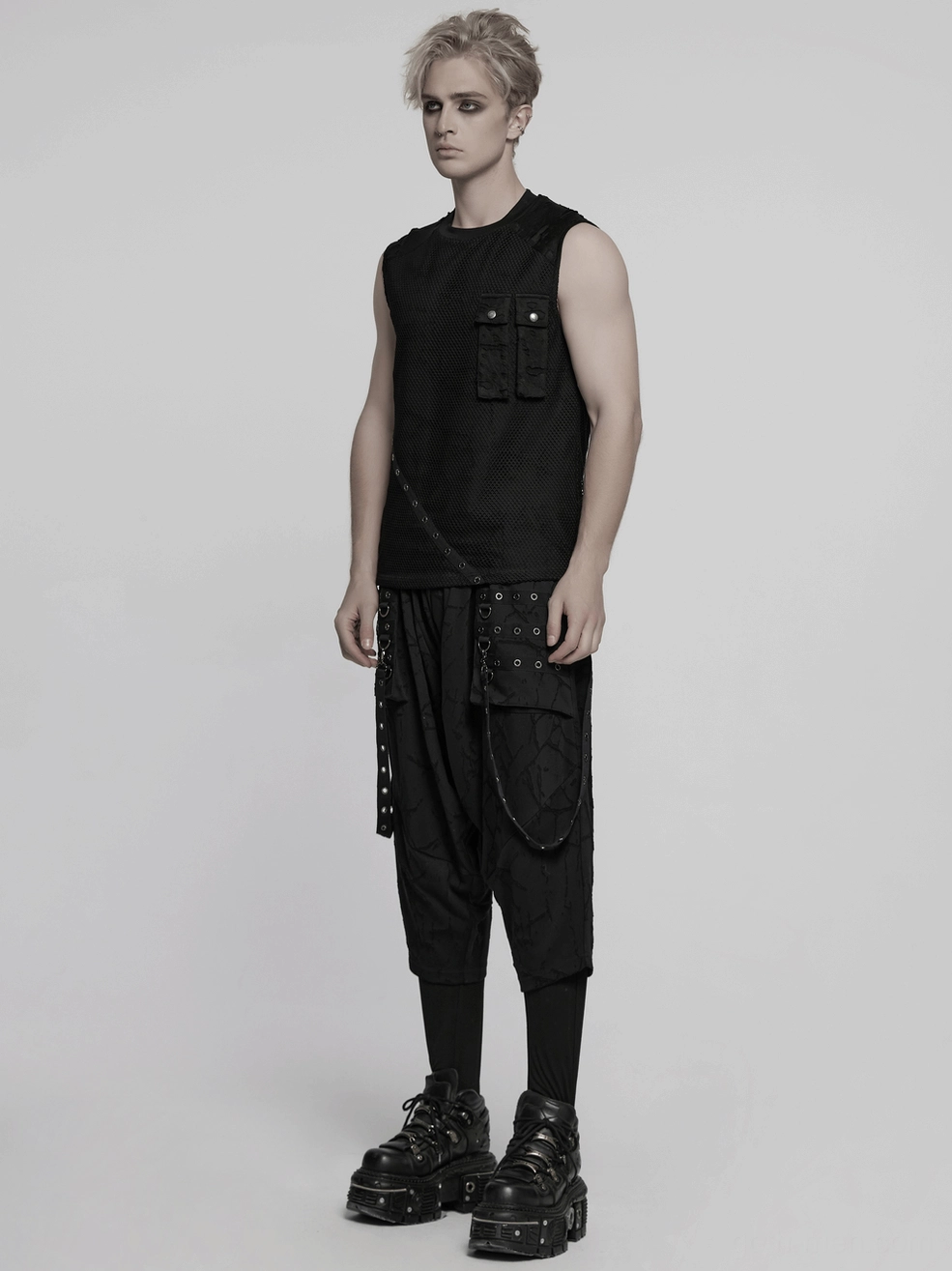 Black gothic mesh tank top fabric texture detail highlighting knitted base and mesh overlay construction quality
