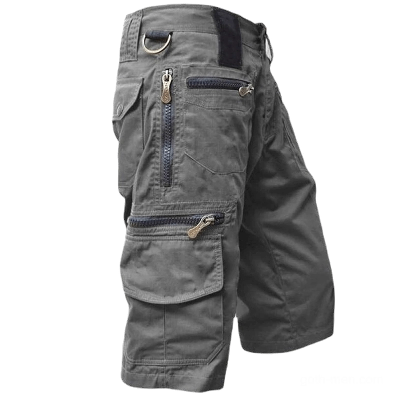 Dark gray calf-length military cargo shorts with D-ring waist detail and tactical pockets, left side profile