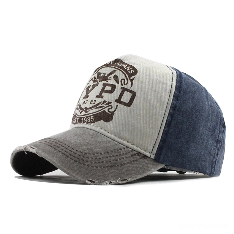 Navy and gray gothic vintage snapback cap with NYPD logo, distressed edges and color-blocked design