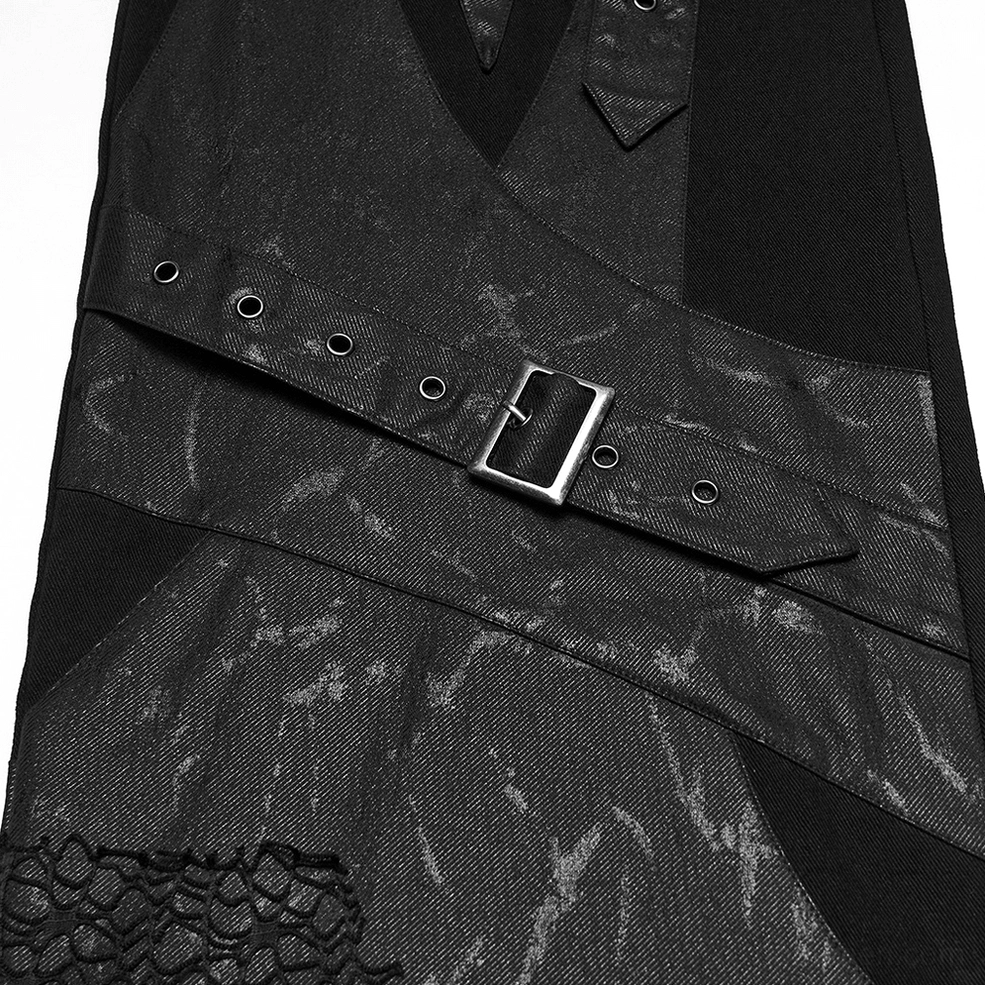 Gothic wide-leg pants strap detail showing marbled faded black leather and metal buckles