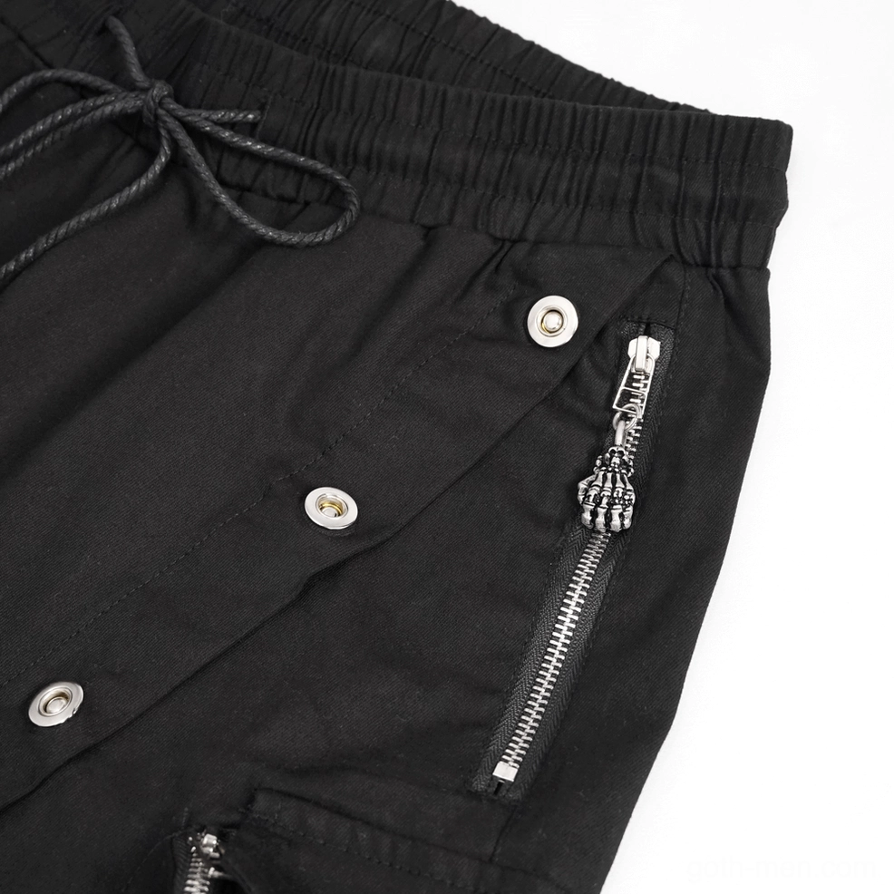 Close-up of black gothic cargo pants waistband showing adjustable drawstring and metal aglet details