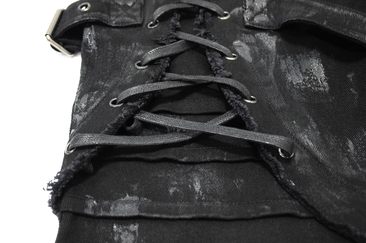 Detailed view of fabric texture and lacing mechanism on black gothic trousers right leg