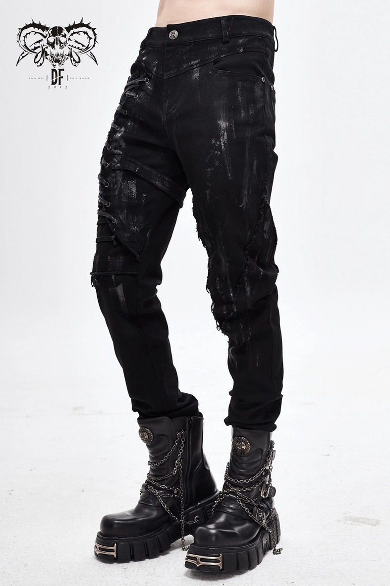 Detailed view of lacing mechanism and fabric structure on black gothic pants right leg