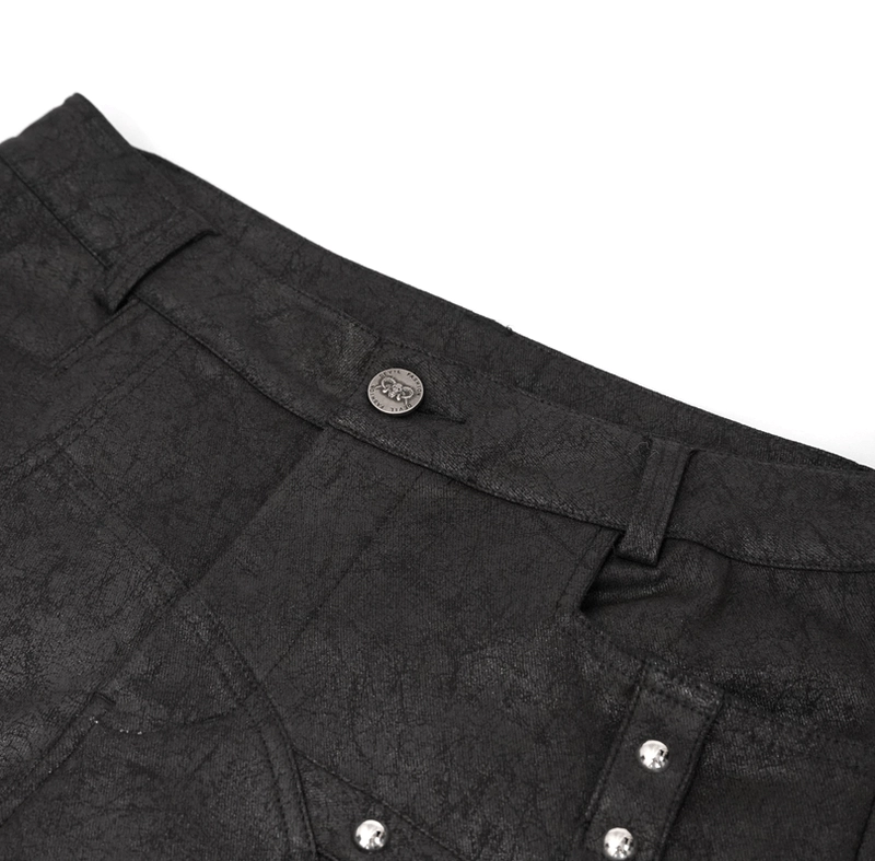 Waist detail top-down close-up metal button rivets cracked black fabric texture