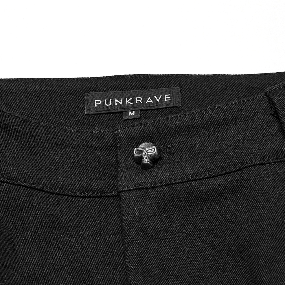 Waistband detail showing PUNKRAVE label and skull-shaped button closure with belt loops