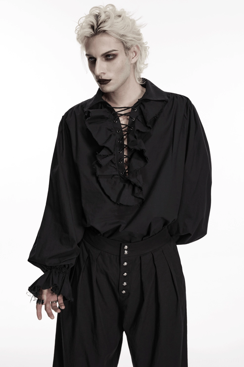 Black gothic poet shirt styling detail showing bishop sleeve volume and romantic aesthetic