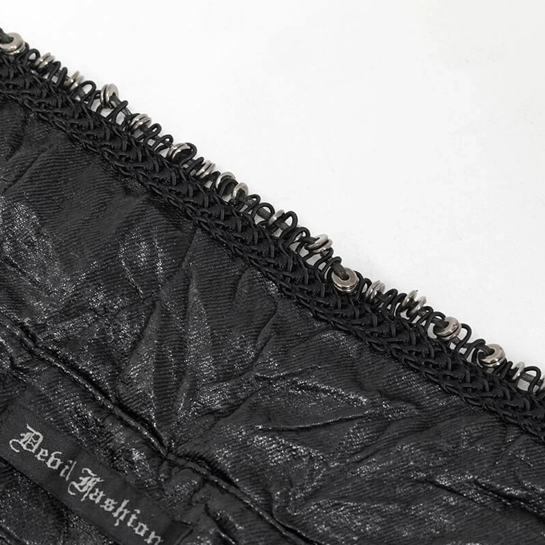 Close-up detail of gothic black punk shirt metal chain collar trim with crinkled fabric