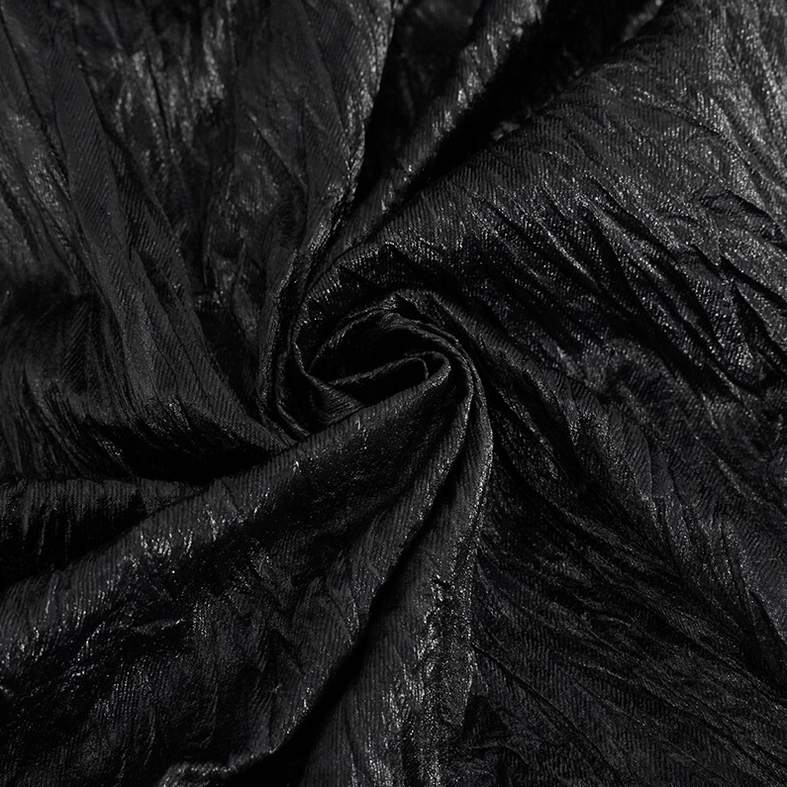 Textile close-up showing deep crinkled texture and glossy black finish of gothic punk shirt synthetic leather