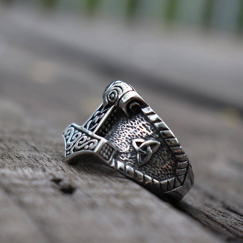 Gothic Celtic ring low angle view - trinity knot on band and twisted edge trim showing Norse craftsmanship