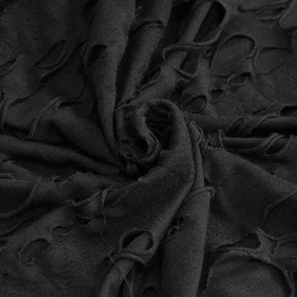 Black gothic ripped hoodie sleeve detail, mesh panel and distressed fabric showing contemporary goth construction