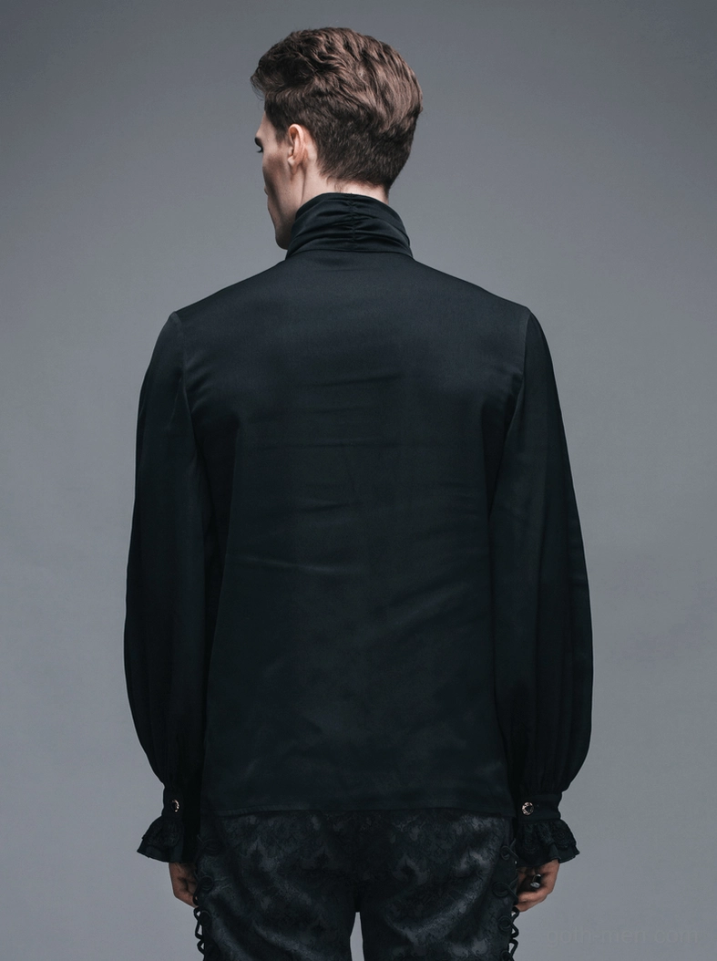 Rear view of Gothic ruffled shirt worn by male model, showcasing long sleeve construction and buttoned cuff details
