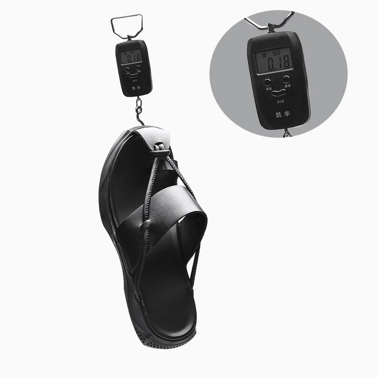 Bottom three-quarter view of gothic sandals with honeycomb anti-slip pattern and arch support