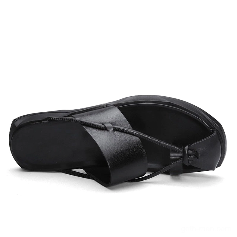 Rear view of gothic ankle-wrap sandals showing open heel construction and smooth leather finish