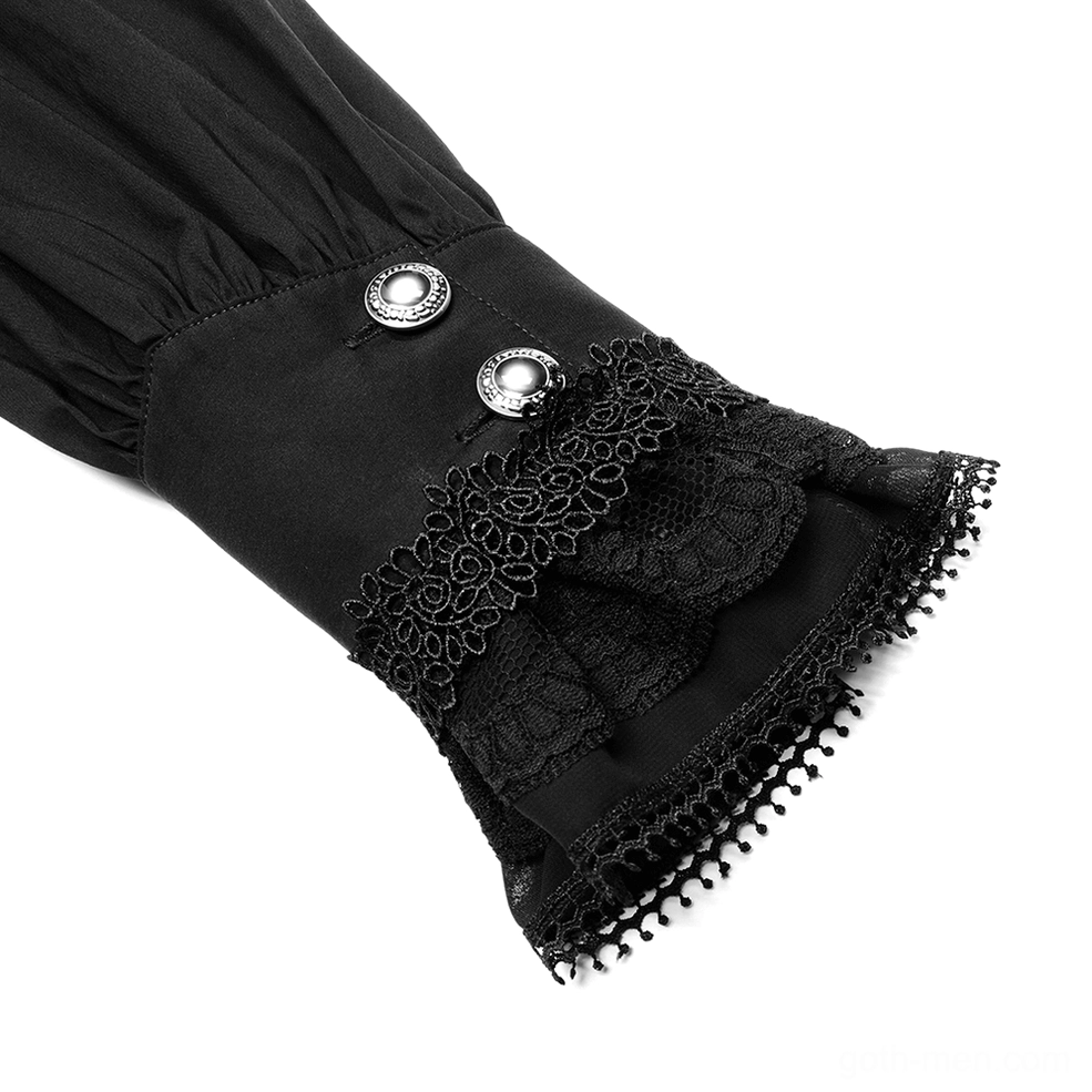 Close-up macro detail of black lace-trimmed cuff with scalloped edge and silver round button