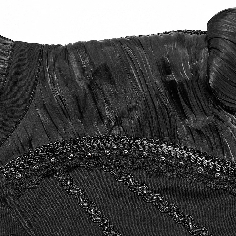 Decorative trim detail close-up of Victorian gothic shirt showing braided trim, lace edging and metal stud embellishments