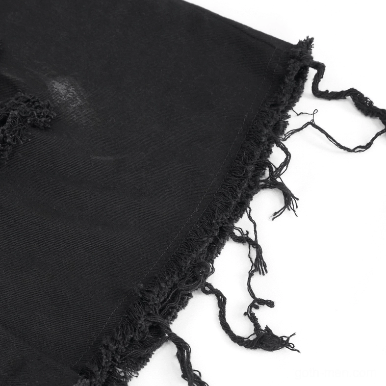 Close-up shot of distressed gothic shirt bottom hem showing frayed tassel edges and black woven fabric texture