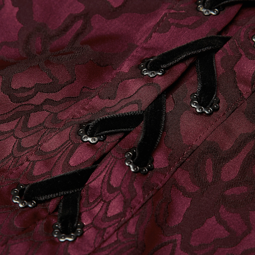 Close-up detail of men's gothic shirt lace-up front placket with black velvet laces and vintage metal buckles on burgundy jacquard