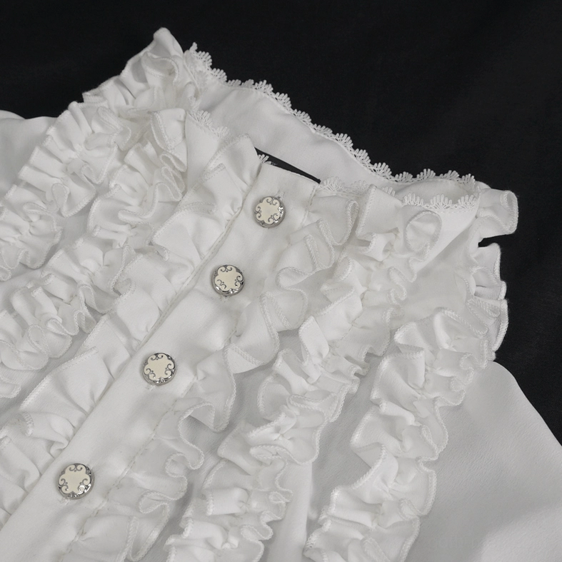 Close-up detail of gothic shirt front placket with round metal buttons and laced ruffles