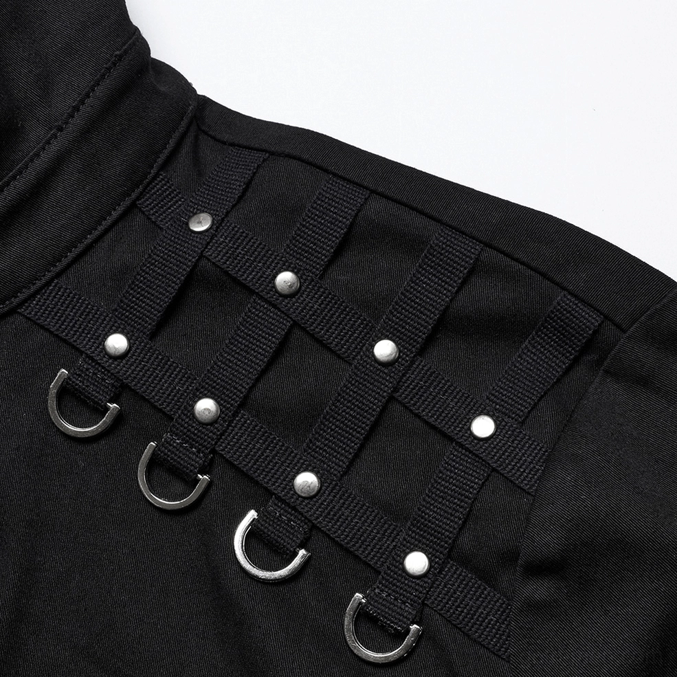 Macro close-up of gothic shirt shoulder hardware showing webbing strap metal studs and D-ring punk accents