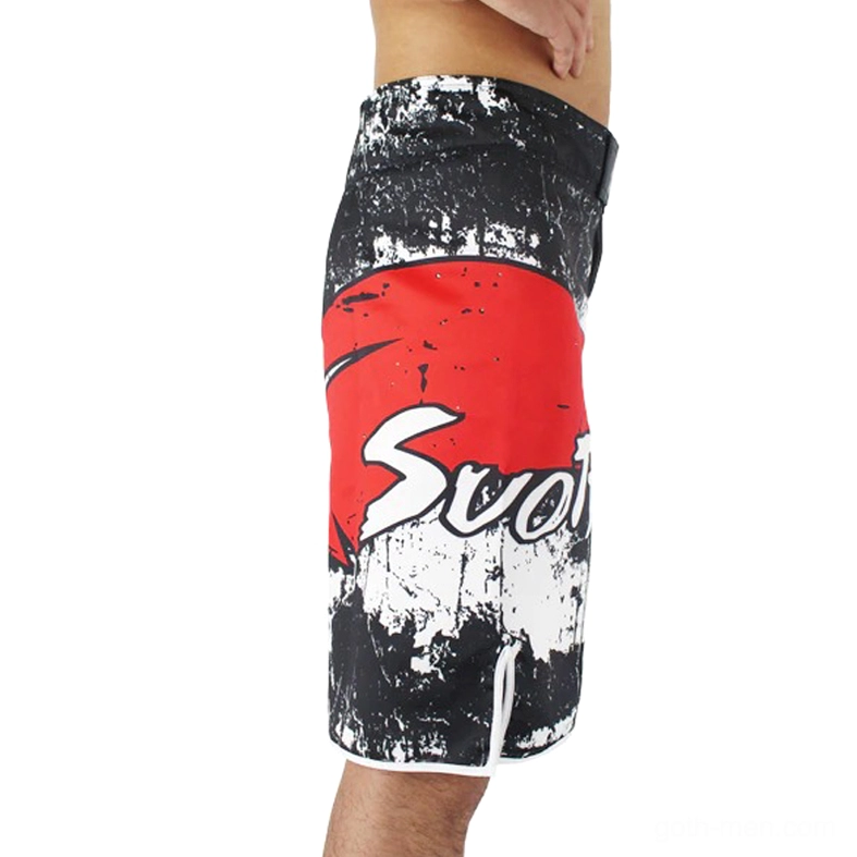 Right side view of gothic black shorts showcasing red side panel accent and skull print detail on male model