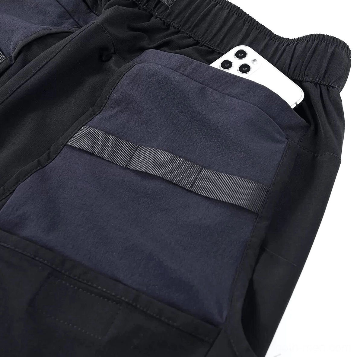 Gothic shorts side pocket interior - smartphone-sized utility pocket with color-block fabric design