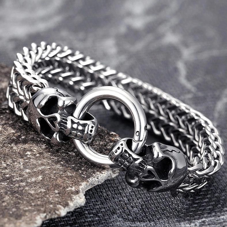 Alternative Men's Skull Bracelet - Stainless Steel Link Chain, Detailed Skull Carving, Vintage Stone Background