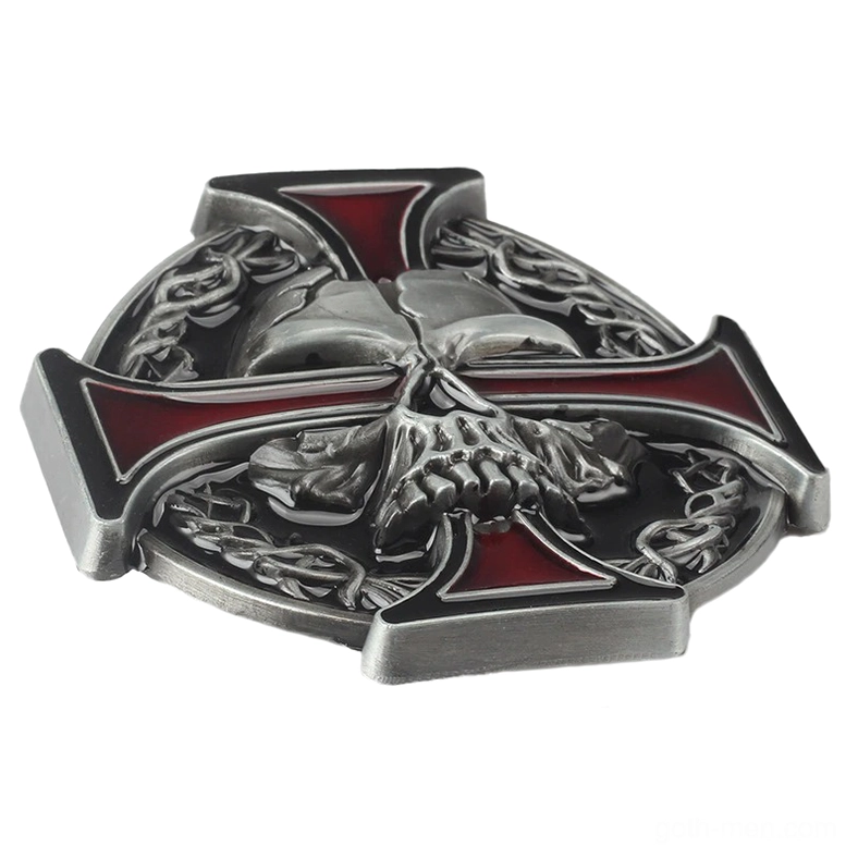 Alternative gothic belt buckle 3D embossed skull design with red enamel details and Celtic knotwork oblique angle
