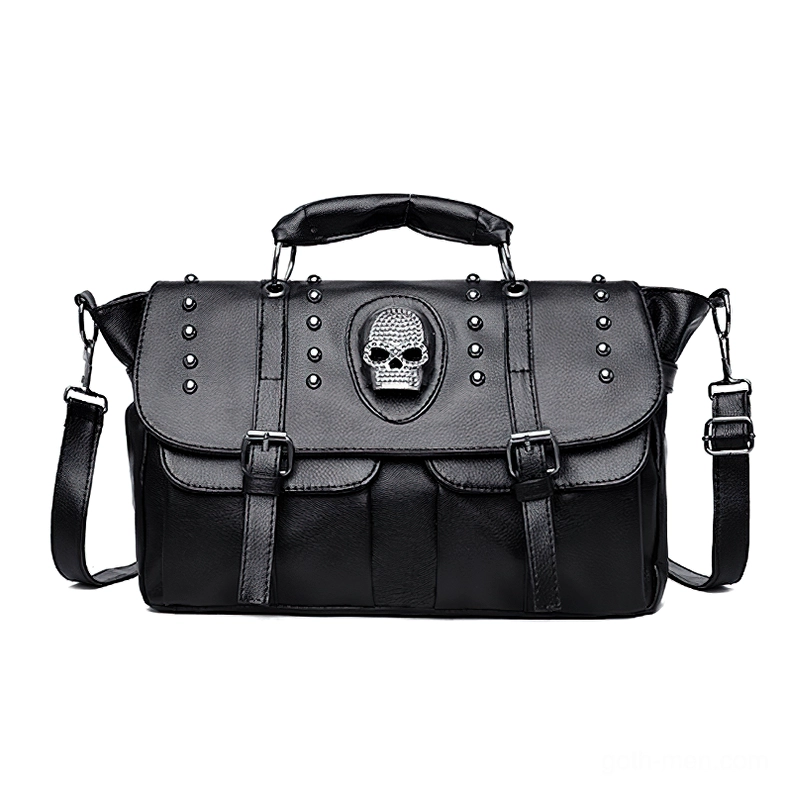 Gothic black skull leather shoulder handbag front view with pebbled PU leather texture and rivet embellishments