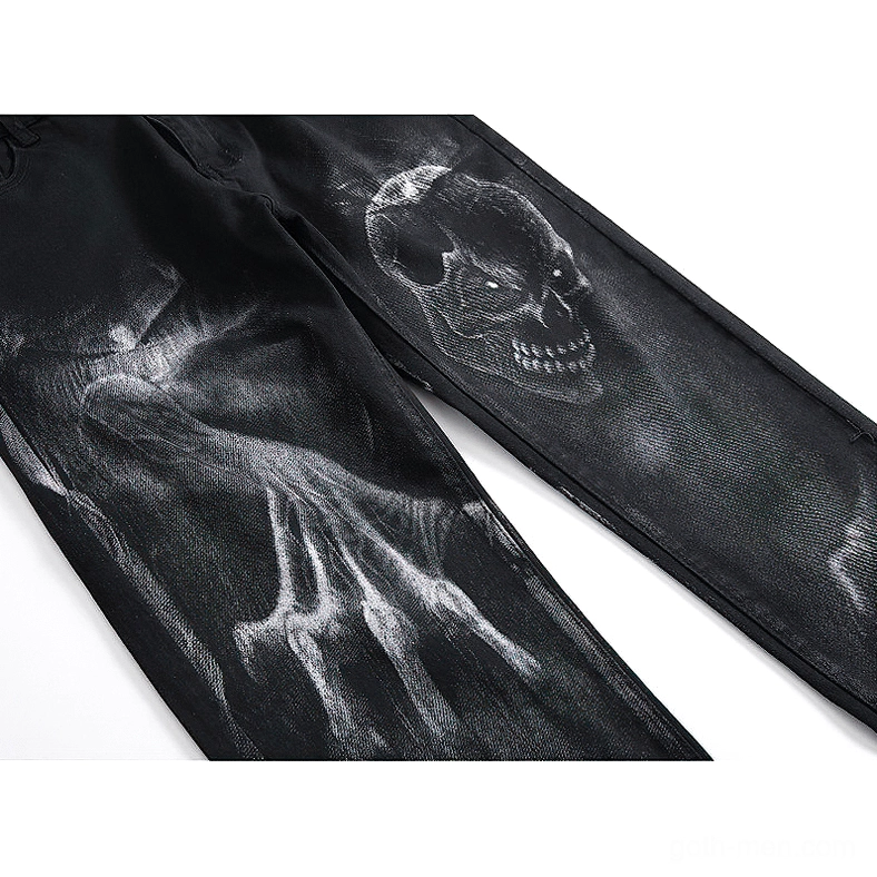 Black denim jeans skull ghost hand print faded texture flat lay close-up