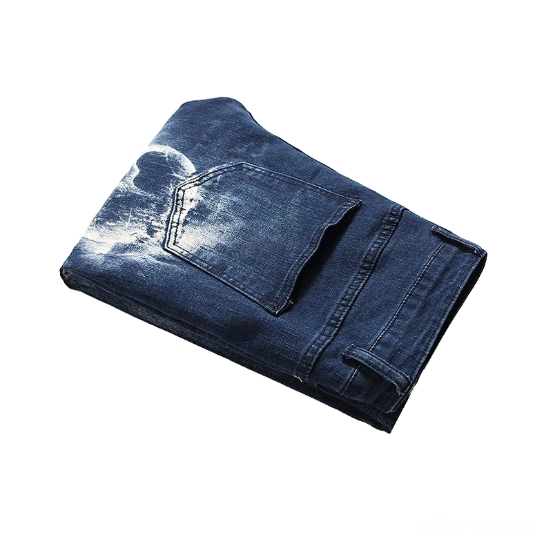 Light blue gothic skull denim showing bleached print effect and streetwear design